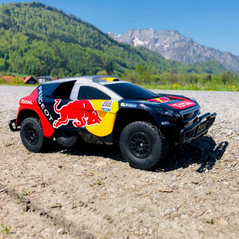 Carrera RC Peugeot 08 DKR 16 - Red Bull modèle radiocommandé Voiture de course sur circuit Moteur électrique 1:16
