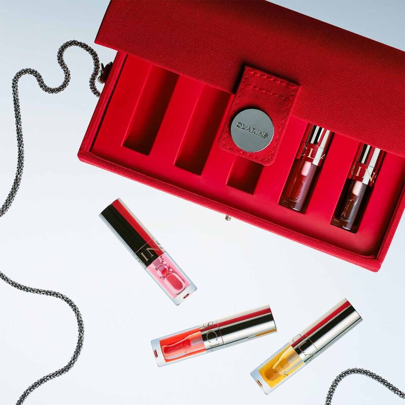 Set Clarins Lip Comfort Oil 01 Honey 1,4ml Lip Comfort Oil 04 Pitaya 1,4ml Lip Comfort Oil 08 Strawberry 1,4ml 